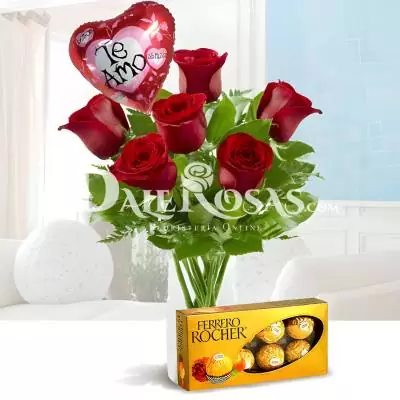 Solitario con Rosas Me Enamoras - Rosas - No hay nada más romantico que obsequiar flores, que mujer podría resistir ante este detalle?, en esta fecha especial demuestra todo tu amor obsequiando este delicado solitario compuesto de 6 rosas y follajes verdes, está acompañado de una caja de chocolates Ferrero Rocher por 8 unidades y un globo metalizado "Te Amo". (Los productos adicionales pueden variar según disponibilidad). Te recomendamos acompañar este diseño con globos, chocolates, peluches o vinos para hacer aún más especial tu detalle, en el siguiente paso de la compra puedes agregar a tu orden estos productos si lo deseas. - Dalerosas